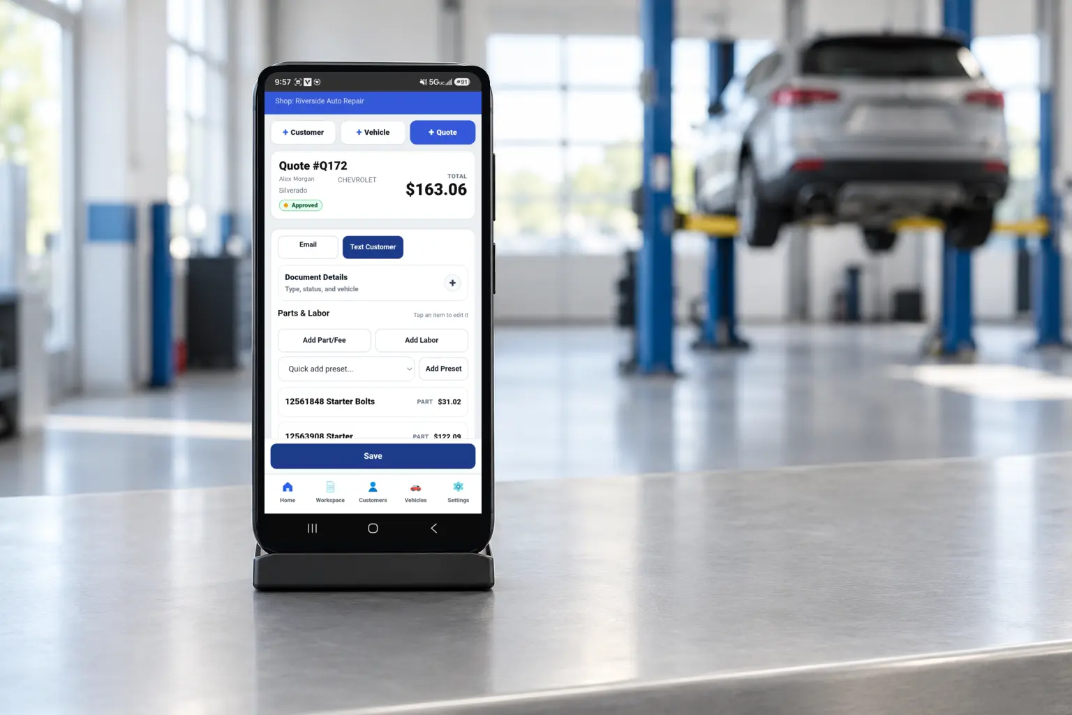 PistonCMS quote and invoice management shown on a mobile phone in a repair shop